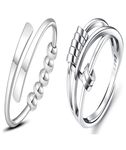 Detailed macro view of S925 sterling silver anti-anxiety rings with rotating beads