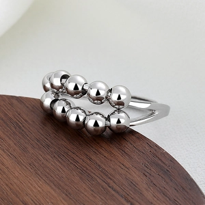 Double-layered rotatable bead anxiety ring in silver finish for stress relief
