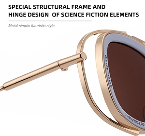 Macro shot of mechanical metal hinges and engraved details on oval steampunk sunglasses