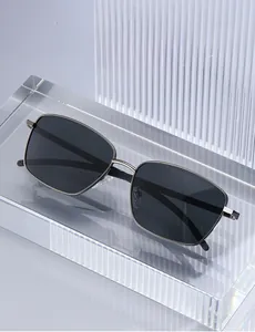 Detail view of square polarized lenses and metallic frame legs with specification codes