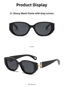 Polished black cat eye sunglasses with gold H-shaped temple detail and grey lenses