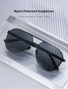 Detail of polarized nylon pilot sunglasses featuring double bridge and spec engravings