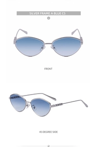 Dettaglio degli occhiali da sole cat eye in metallo argento con lenti blu sfumate e angolazioni