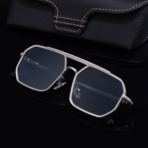 Octagonal metal frame sunglasses with dark lenses and premium leather glasses case