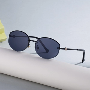 Frameless polygonal sunglasses with dark polarized lenses and gold knot temple accents