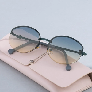 Chic semi-rimless sunglasses with blue-yellow gradient lenses and pink leather case
