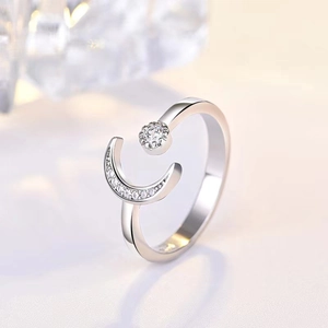 Elegant adjustable silver moon and star open ring with sparkling crystal pave setting