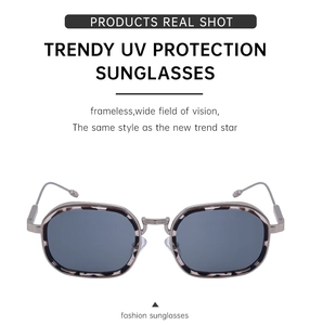 Detail der quadratischen Sonnenbrille mit Schildpatt-Rahmen, Metallsteg und UV-Gläsern