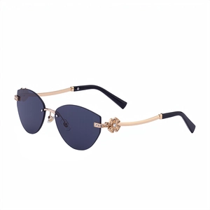 Lunettes de soleil œil de chat sans monture avec branches trèfle à strass et verres gris foncé