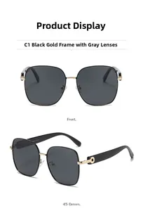 Vue avant et latérale de lunettes de soleil carrées oversize avec monture noir et doré
