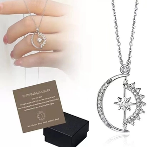 Rotating sun and moon heart pendant necklace in silver with gift box and card