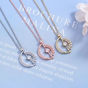 Celestial sun and moon necklaces in gold, rose gold, and silver with sparkling crystals