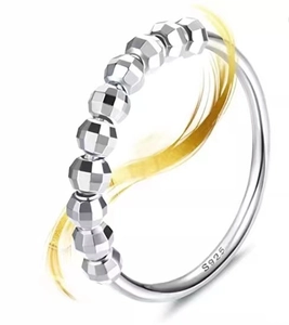 Detailed macro view of S925 sterling silver anxiety ring with 10 rotating faceted beads