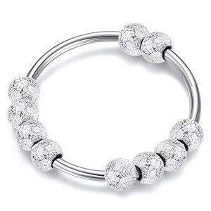 Minimalist silver spinning bead ring with ten textured beads for stress relief