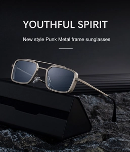 Detail view of gold steampunk square frame sunglasses with a black triangular glasses case