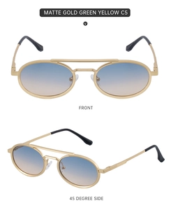 Detail view of oval matte gold sunglasses with blue to yellow gradient lenses and dual bridge