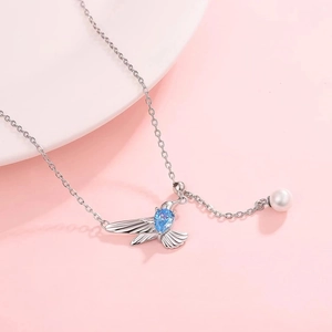 Adjustable hummingbird necklace with blue crystal pendant and pearl accent in silver