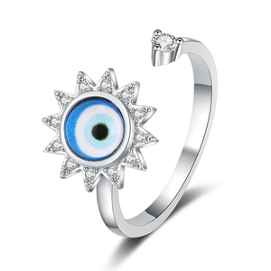Rotating Evil Eye Sun Ring in Sterling Silver with blue zircon and pavé crystals