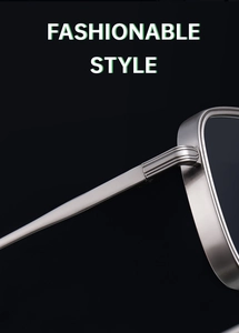 Detail of silver metal frame hinges and textured temples of rectangular sunglasses
