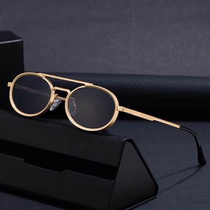 Retro small round gold metal frame sunglasses with black lenses and matching case