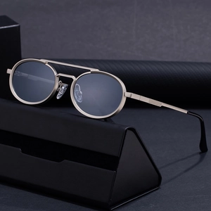 Retro small oval metal sunglasses with double bridge and grey lenses, includes black case