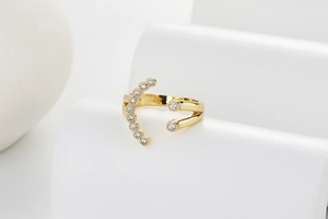 Detailed macro view of S925 hallmark on gold plated sterling silver open ring band