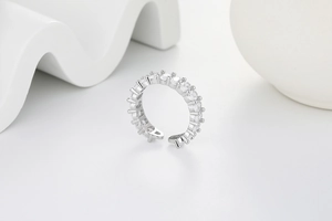 Close-up of adjustable silver ring featuring a full row of sparkling round-cut cubic zirconia