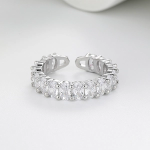 Minimalist silver open ring with multi-pave oval cut zircons in a row setting