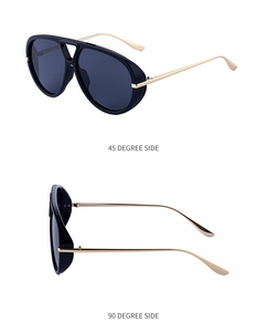 Detail view of pilot sunglasses showing side shields and golden metal temples