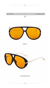 Detailed view of vintage punk aviator sunglasses with orange lenses and gold temples