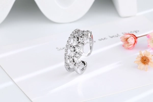 Detail of adjustable double-layer ring with sparkling cubic zirconia marquise stones