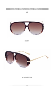 Close-up of pilot style sunglasses with C6 brown gradient lenses and gold metal arms