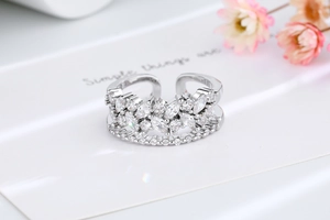Macro shot of silver adjustable double-layer ring with sparkling marquise cut cubic zirconia