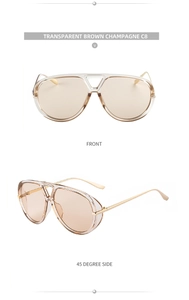 Detail of transparent brown champagne pilot sunglasses with metal temples and dual bridge