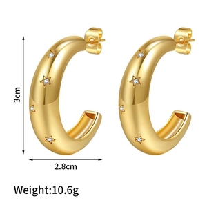 Vintage gold C-shaped earrings with sparkling star zircon inlays for a retro look