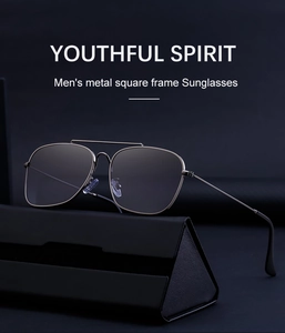 Detail of square frame metal sunglasses with double bridge and leather folding case