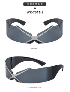 Close-up of Y2K rimless sunglasses with silver X-shaped metal decor and rivets
