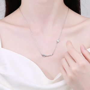 Minimalist silver arrow necklace for women with heart pendant and sparkling zircon stones