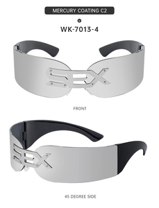 Detail of Y2K rimless sunglasses with mercury coating and metal SEX letter decor