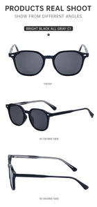 Détails des lunettes de soleil vintage noires avec verres gris et accents argentés