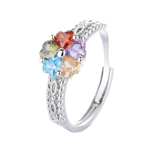 Adjustable floral ring featuring five colorful heart-shaped cubic zirconia petals