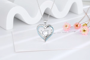 Detail of S925 silver heart necklace with blue zircon and I love you engraving