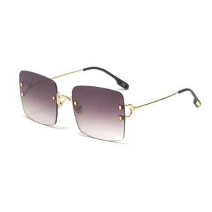 Fashionable rimless square sunglasses with gradient lenses and gold C-shaped metal temples
