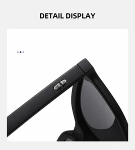 Detailaufnahme der mattschwarzen Sonnenbrille mit silbernen Metallakzenten am Bügel