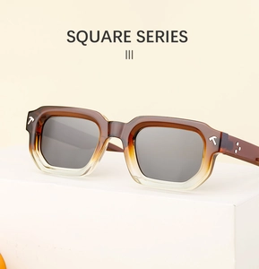 Détail macro de lunettes de soleil carrées marron avec charnière en T et rivets en métal
