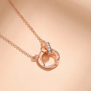 Interlocking Mobius rings necklace in rose gold with diamonds and Fall in Love engraving