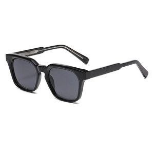 Classic black square frame sunglasses with dark grey lenses in a 45-degree side view