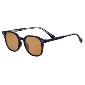 Lunettes de soleil rétro monture noire ronde verres ambrés et détails de rivets