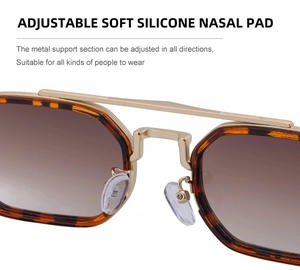 Détail macro des plaquettes de nez réglables en silicone sur lunettes de soleil vintage