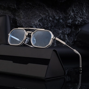Lunettes de soleil rétro en métal argenté avec verres bleus et étui noir